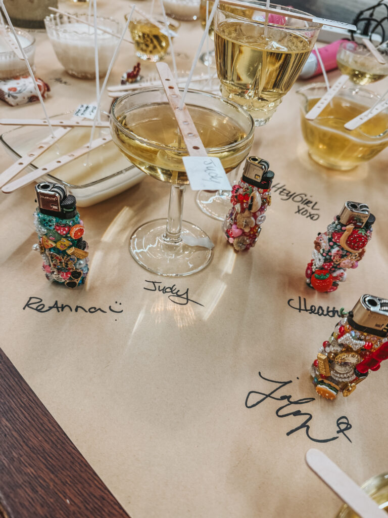 Diy beaded lighter charm project displayed at a festive women's crafting event and autograph.